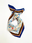 24 inch silk twill scarf made in Italy. Bold colors enhance the beautiful design of historical reference